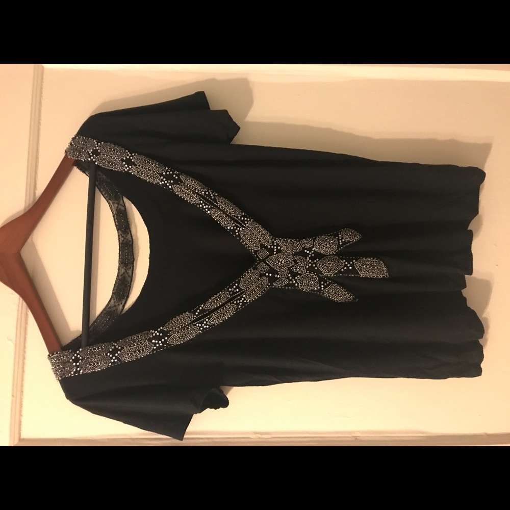 Black top with dramatic back
